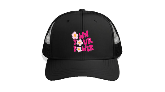 Baseball cap Black' OWN YOUR POWER" in a stacked 1970s bubble font punctuated by custom retro ditsy flowers  182