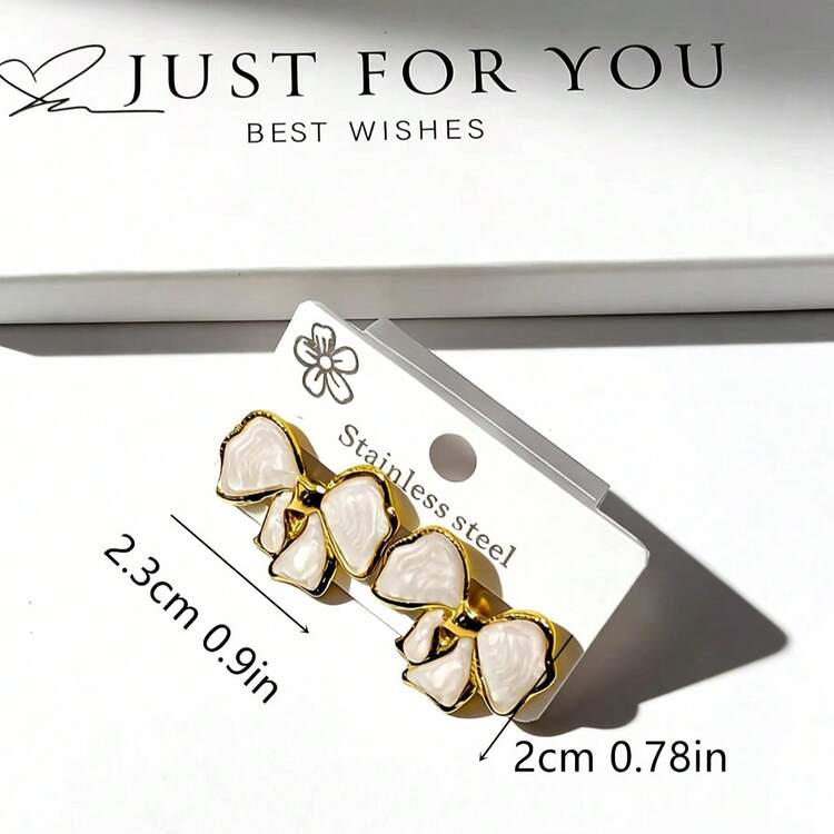 stainless steel earrings, white bow studs, anti tarnish jewelry, gold plated bowknot, hypoallergenic ear studs, coquette aesthetic accessories, enamel ribbon earrings, waterproof gold earrings, cute teen girls gifts, durable minimalist studs