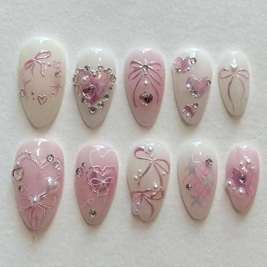 24 pcs coquette press on nails, pink bow fake nails, balletcore nail art, cute 3d pressons, heart crystal false nails, almond shaped glue ons, soft girl aesthetic, handmade luxury nails, pearls and rhinestones nails, princess core fake nails