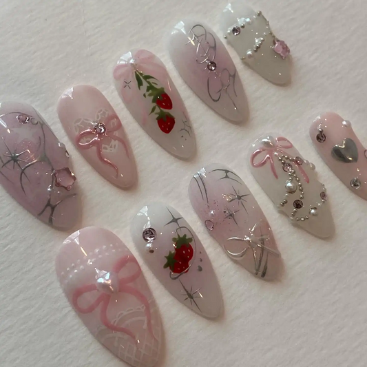 strawberry press on nails, cyber y2k fake nails, pink bow nail art, 3d chrome stars nails, pearl chain false nails, almond shaped glue ons, coquette aesthetic nails, handmade luxury pressons, cute anime fake nails, soft girl nails pack