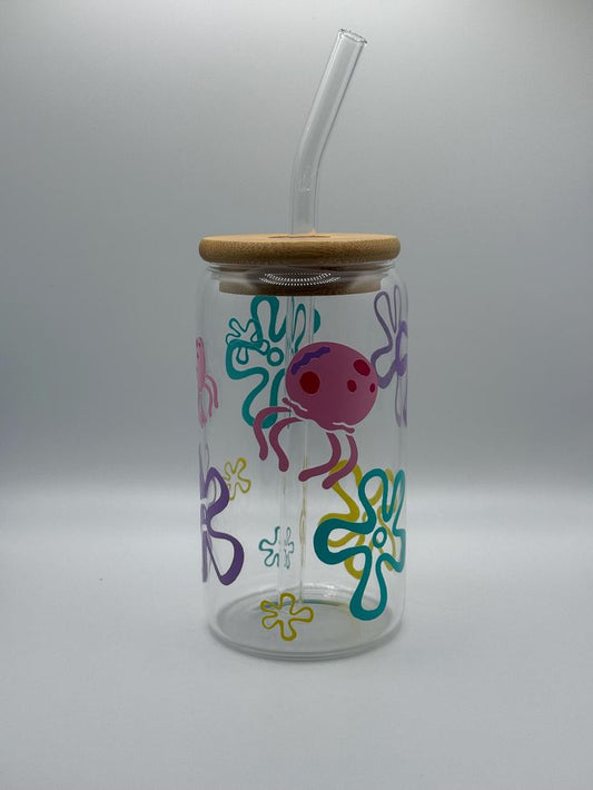 Mug with Wooden Lid and Clear Glass Straw: Practical for Juices and Ice Coffee A cute sea creature resembling a pink octopus with red spots
